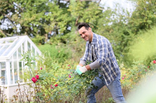 Customer and gardener discussing a garden area